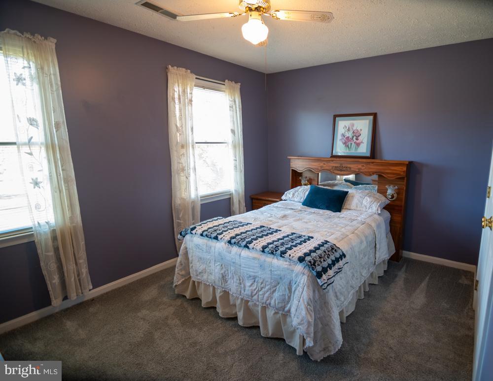 15900 Bald Eagle School Road Brandywine, MD 20613 - Photo 25 of 33 a bedroom with a bed and window