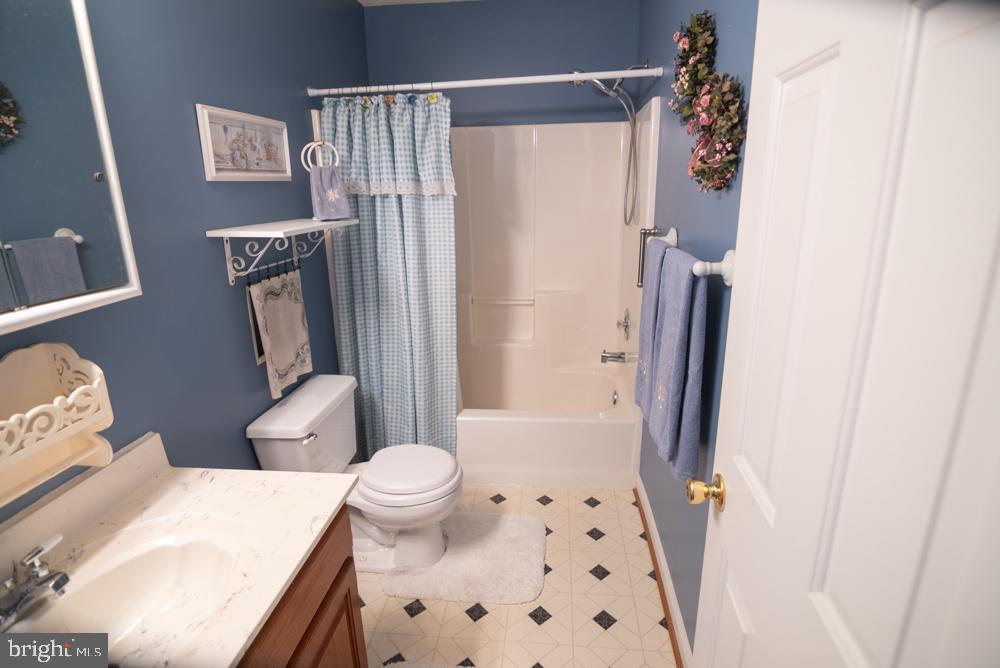 15900 Bald Eagle School Road Brandywine, MD 20613 - Photo 26 of 33 a bathroom with a sink toilet and shower
