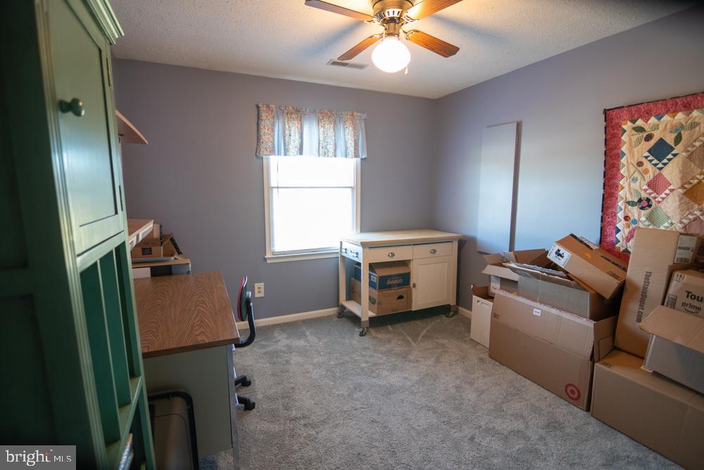 15900 Bald Eagle School Road Brandywine, MD 20613 - Photo 28 of 33 a room with a window and chandelier