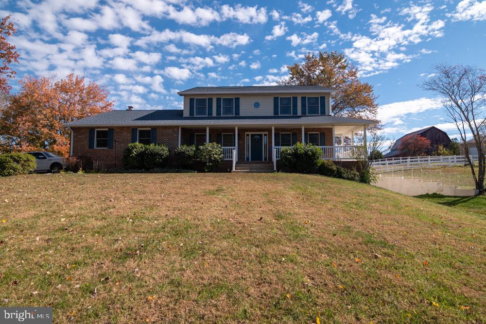 15900 Bald Eagle School Road Brandywine, MD 20613 - Photo 6 of 33 a front view of house with yard and trees around