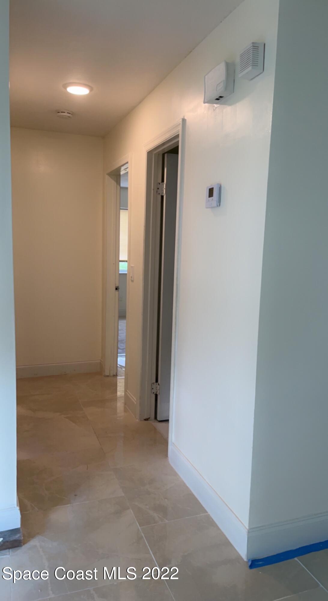 219 Eldron Boulevard Southeast Palm Bay, FL 32909 - Photo 5 of 9 a view of an empty room