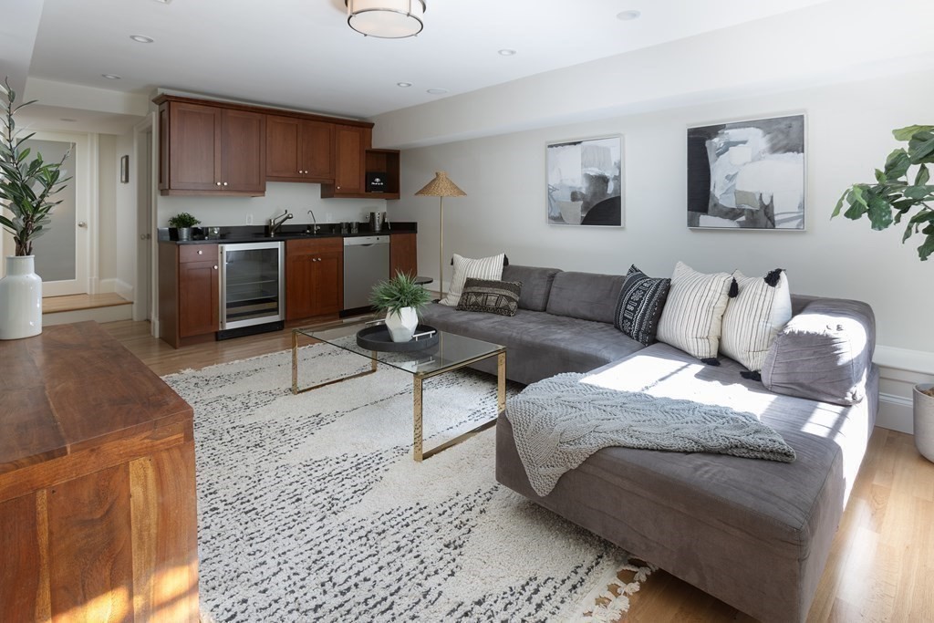 28 Rutland Square, Unit 1 Boston, MA 02118 - Photo 14 of 16 a living room with furniture and a rug