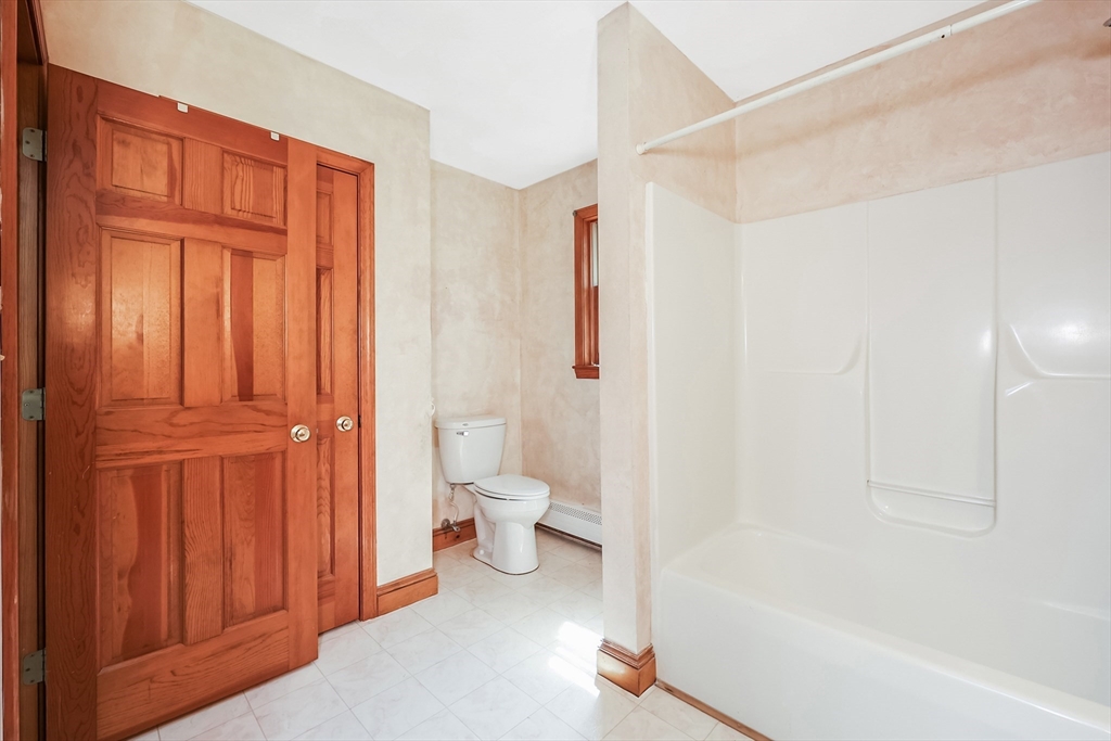6 Ryan Road Townsend, MA 01474 - Photo 27 of 41 a bathroom with a shower a toilet and a sink