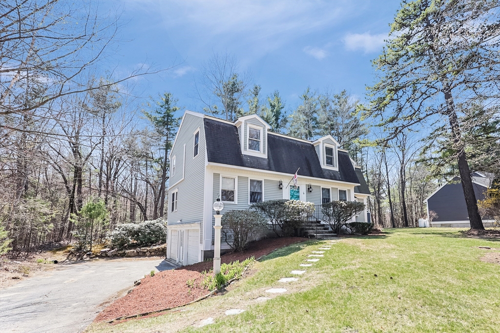 6 Ryan Road Townsend, MA 01474 - Photo 40 of 41 a front view of house with yard and trees around