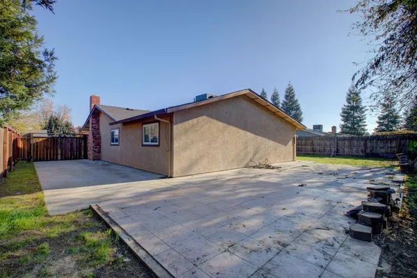 a front view of a house with yard