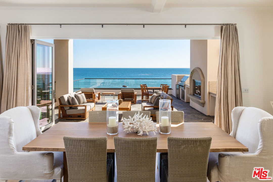31418 Broad Beach Road Malibu, CA 90265 - Photo 8 of 23 a dining room with furniture and a large window