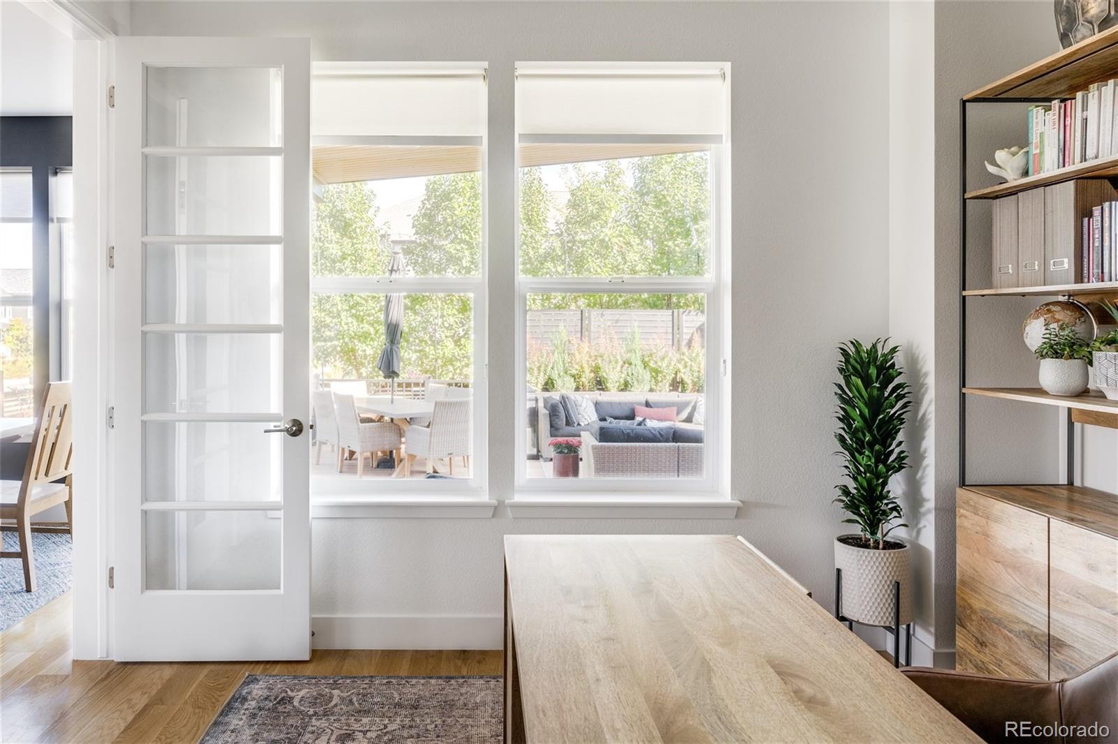7790 East 32nd Avenue Denver, CO 80238 - Photo 11 of 40 a room with window and wooden floor