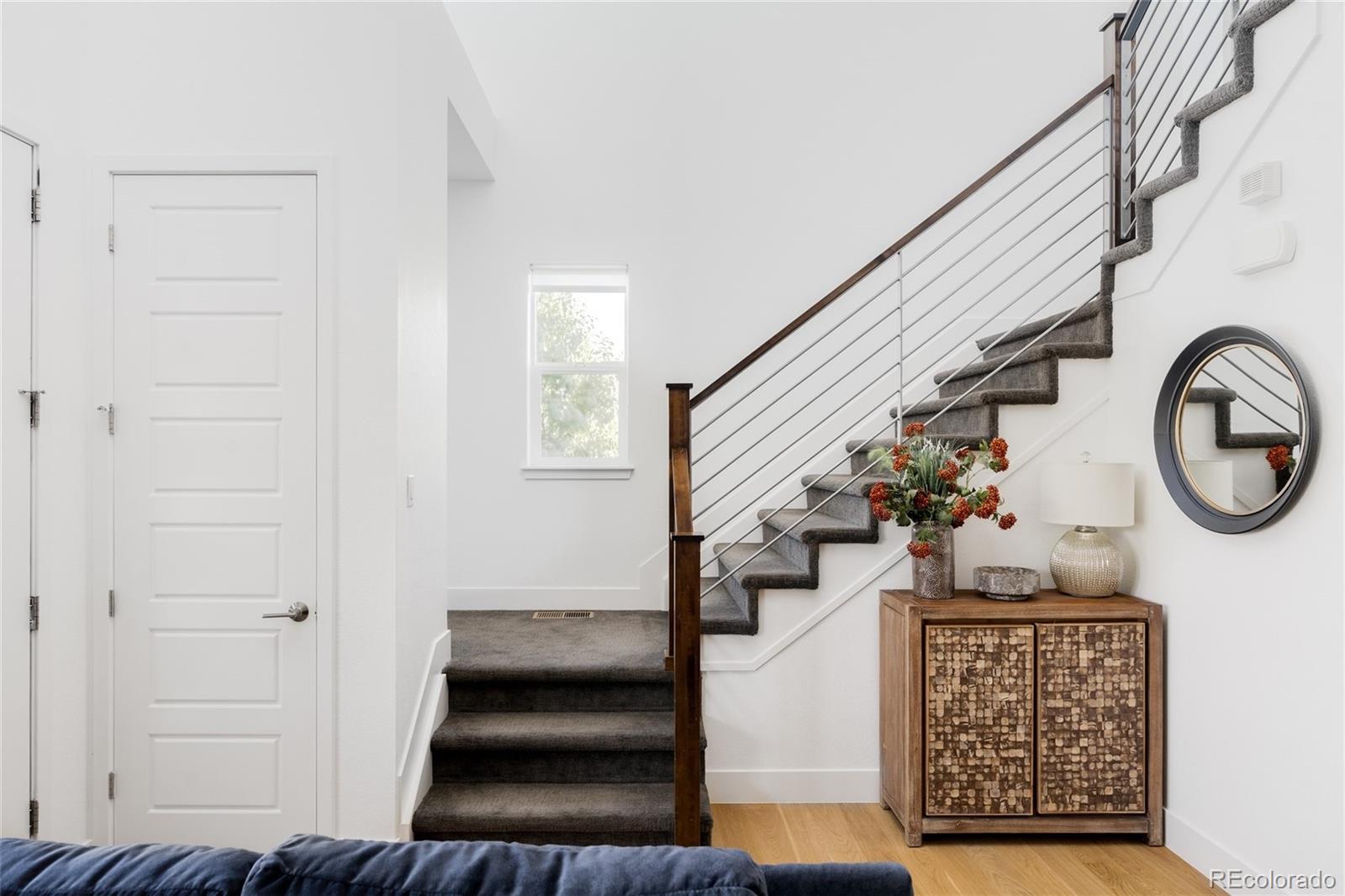 7790 East 32nd Avenue Denver, CO 80238 - Photo 13 of 40 a view of entryway with furniture and rug