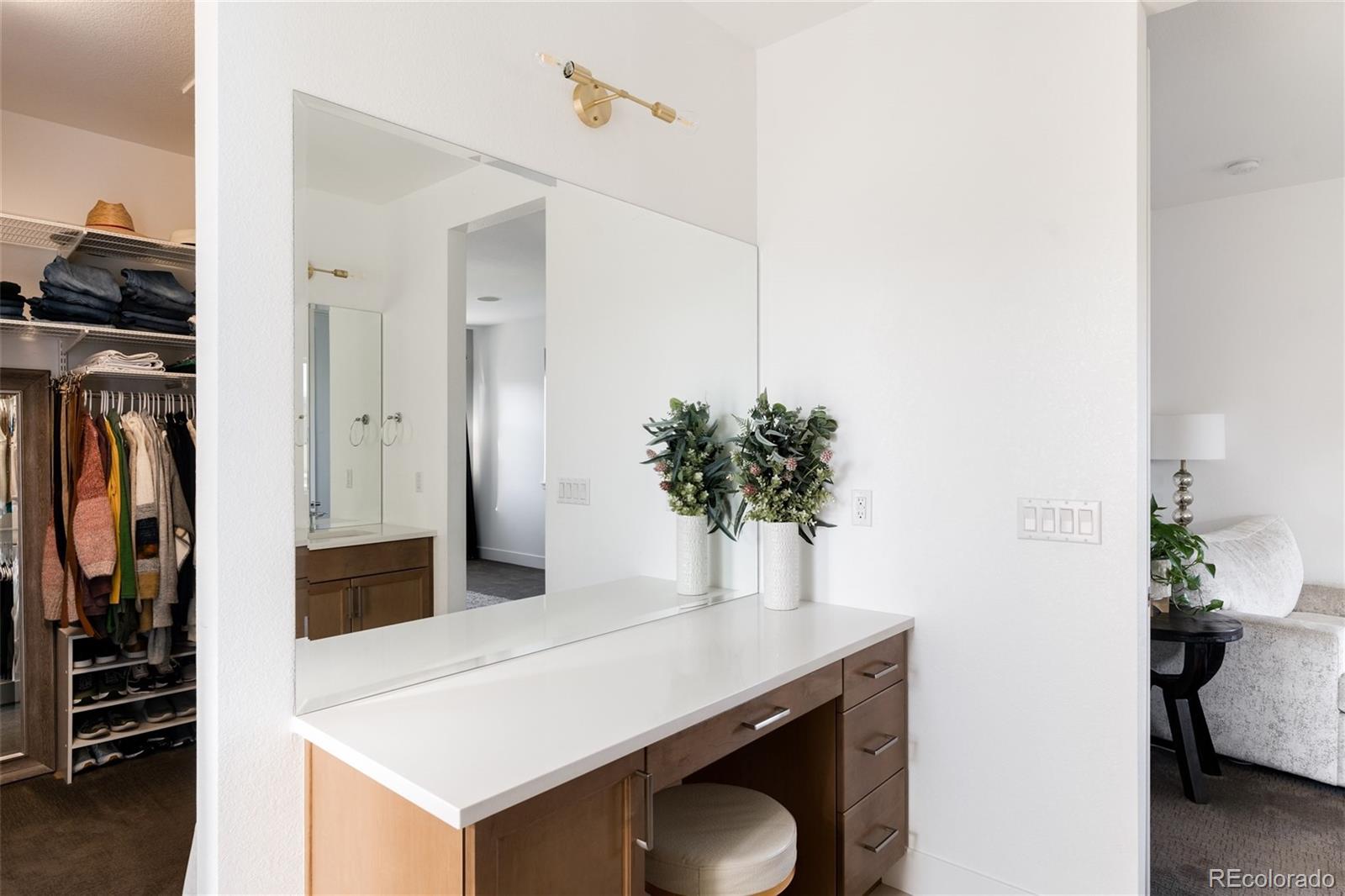 7790 East 32nd Avenue Denver, CO 80238 - Photo 20 of 40 a living room with furniture and potted plant