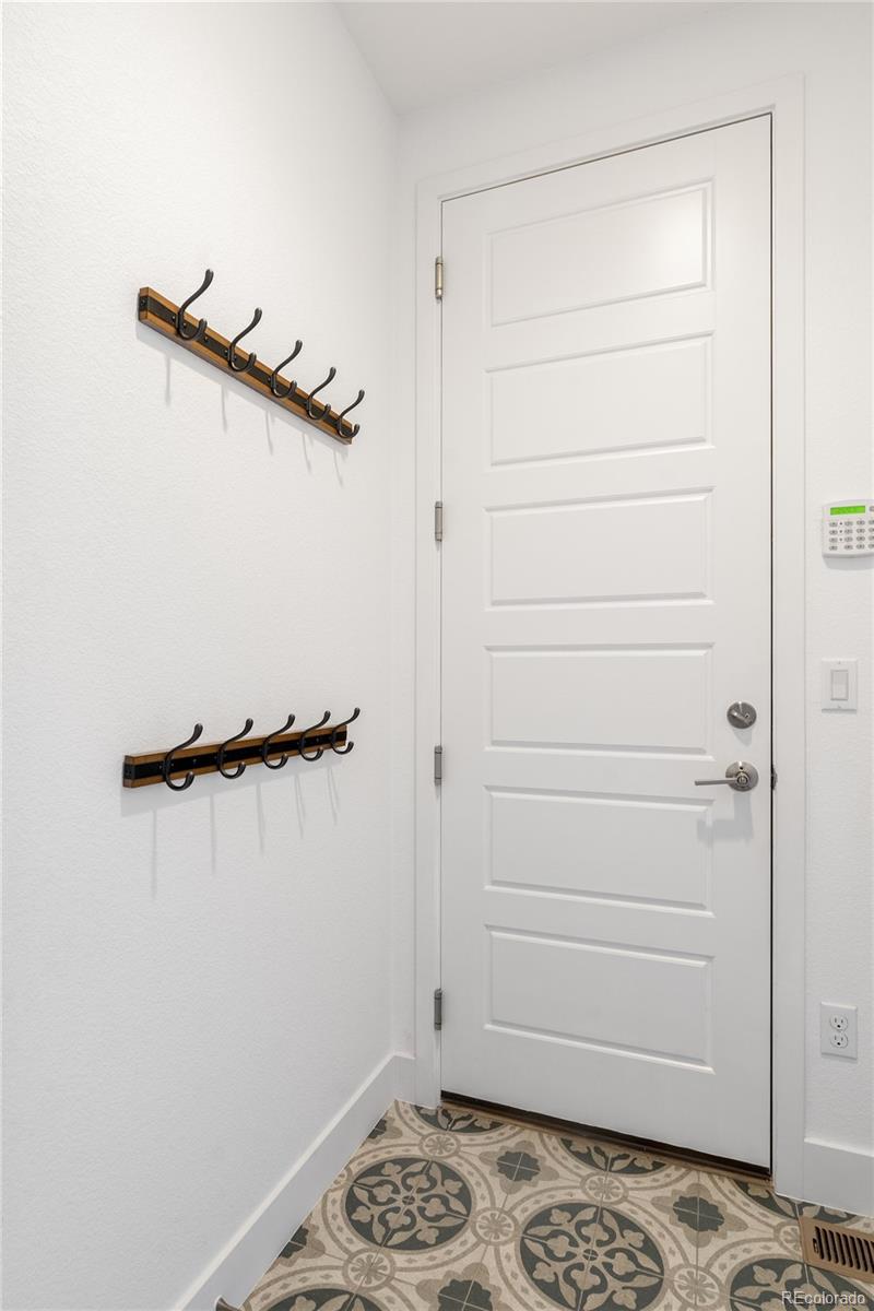 7790 East 32nd Avenue Denver, CO 80238 - Photo 30 of 40 a view of a room with rack on the wall