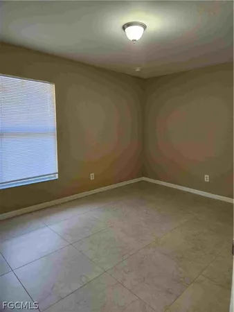 a view of a room with a window