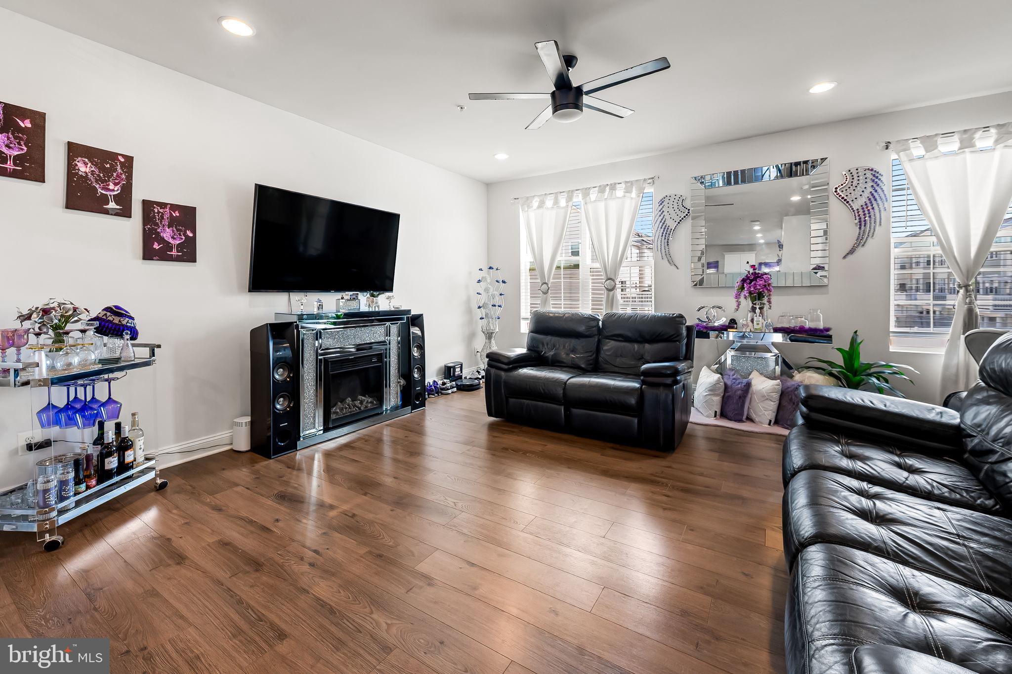 1309 Spindrift Road Aberdeen, MD 21001 - Photo 13 of 35 a living room with furniture and a flat screen tv