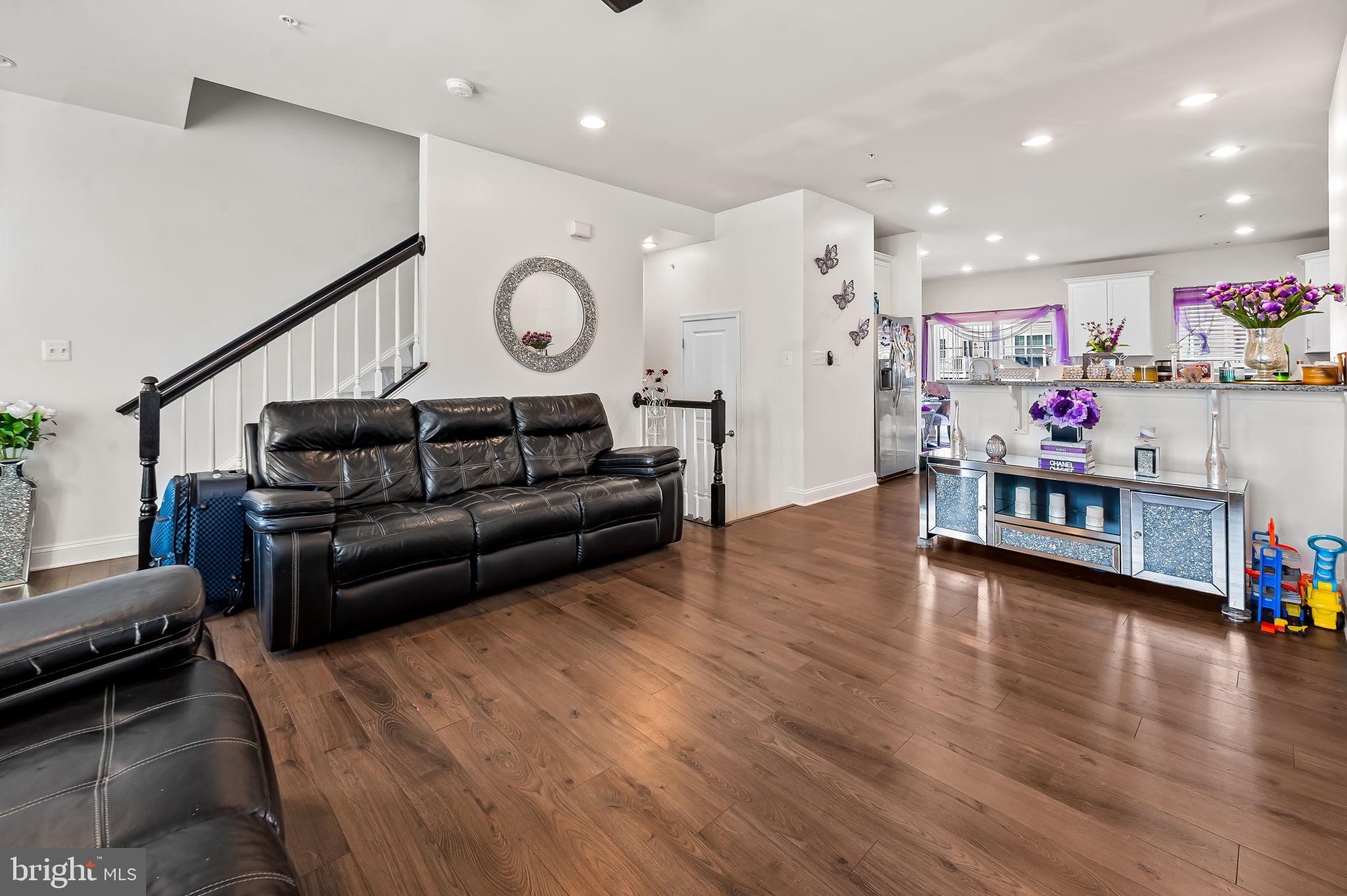 1309 Spindrift Road Aberdeen, MD 21001 - Photo 15 of 35 a living room with furniture and wooden floor