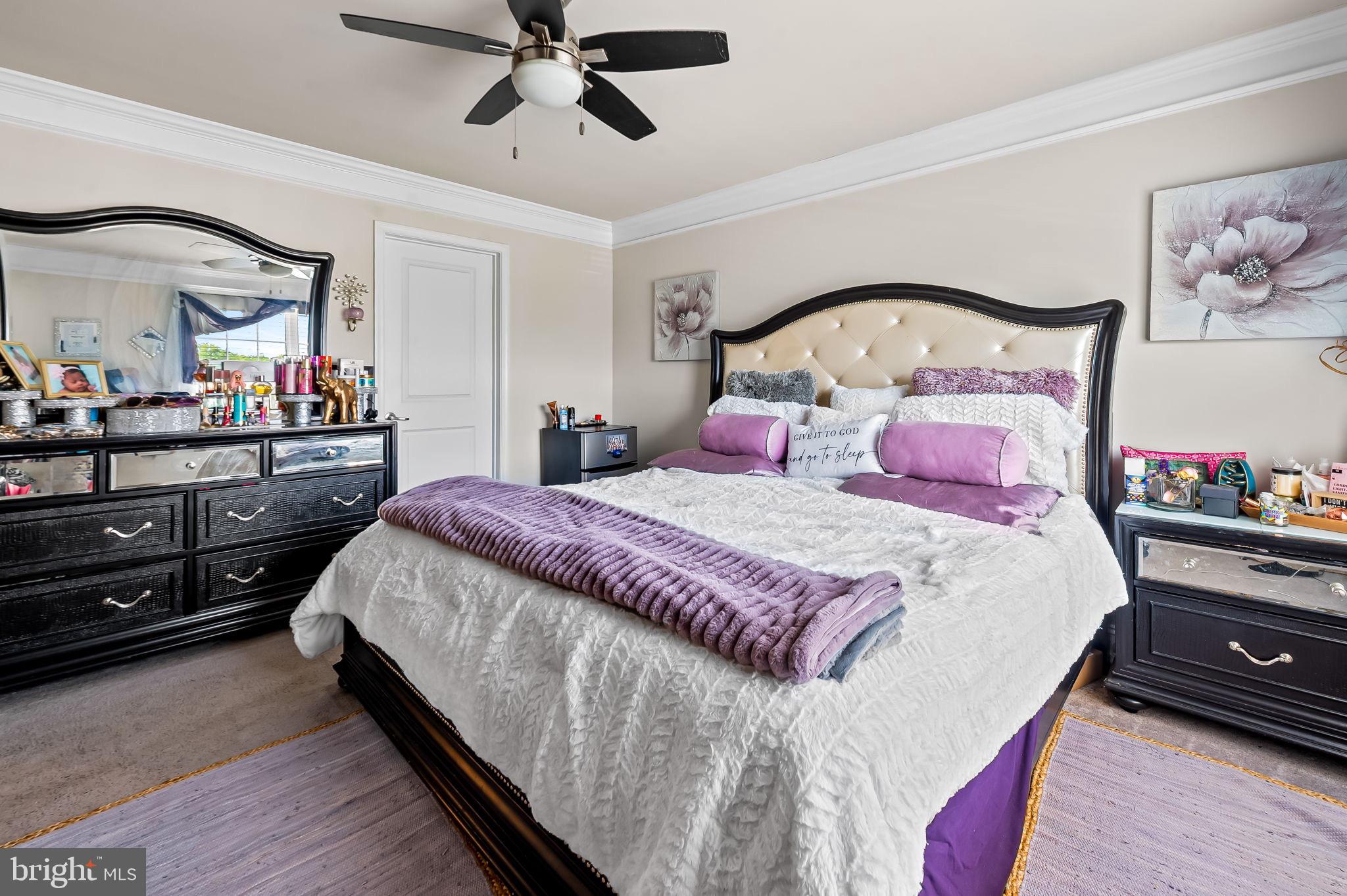 1309 Spindrift Road Aberdeen, MD 21001 - Photo 21 of 35 a bedroom with a bed and a mirror on dresser
