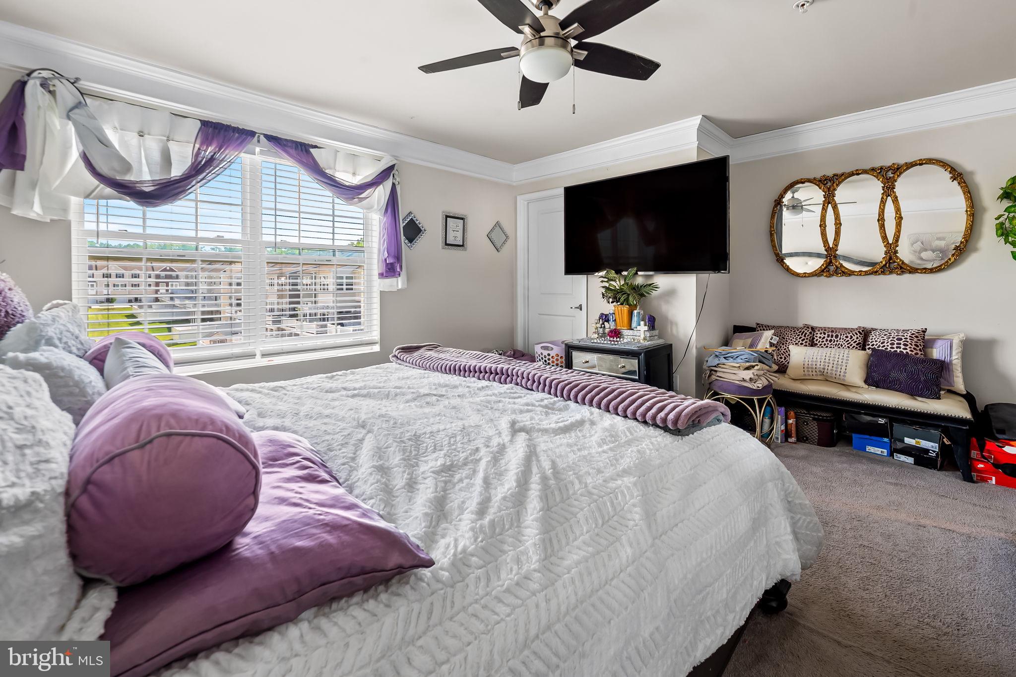 1309 Spindrift Road Aberdeen, MD 21001 - Photo 22 of 35 a bedroom with bed and a flat tv screen on dresser