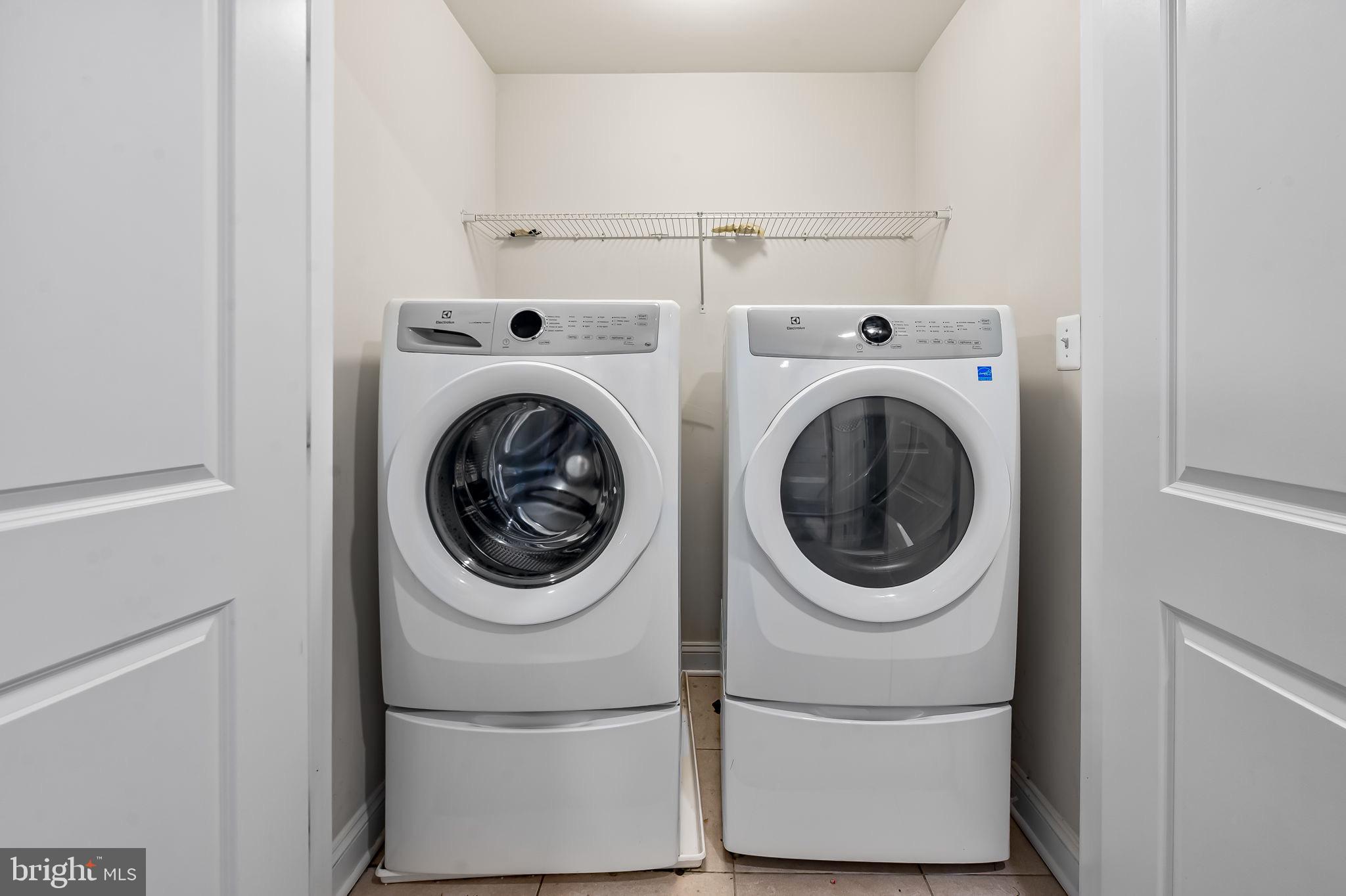 1309 Spindrift Road Aberdeen, MD 21001 - Photo 30 of 35 a utility room with dryer and washer