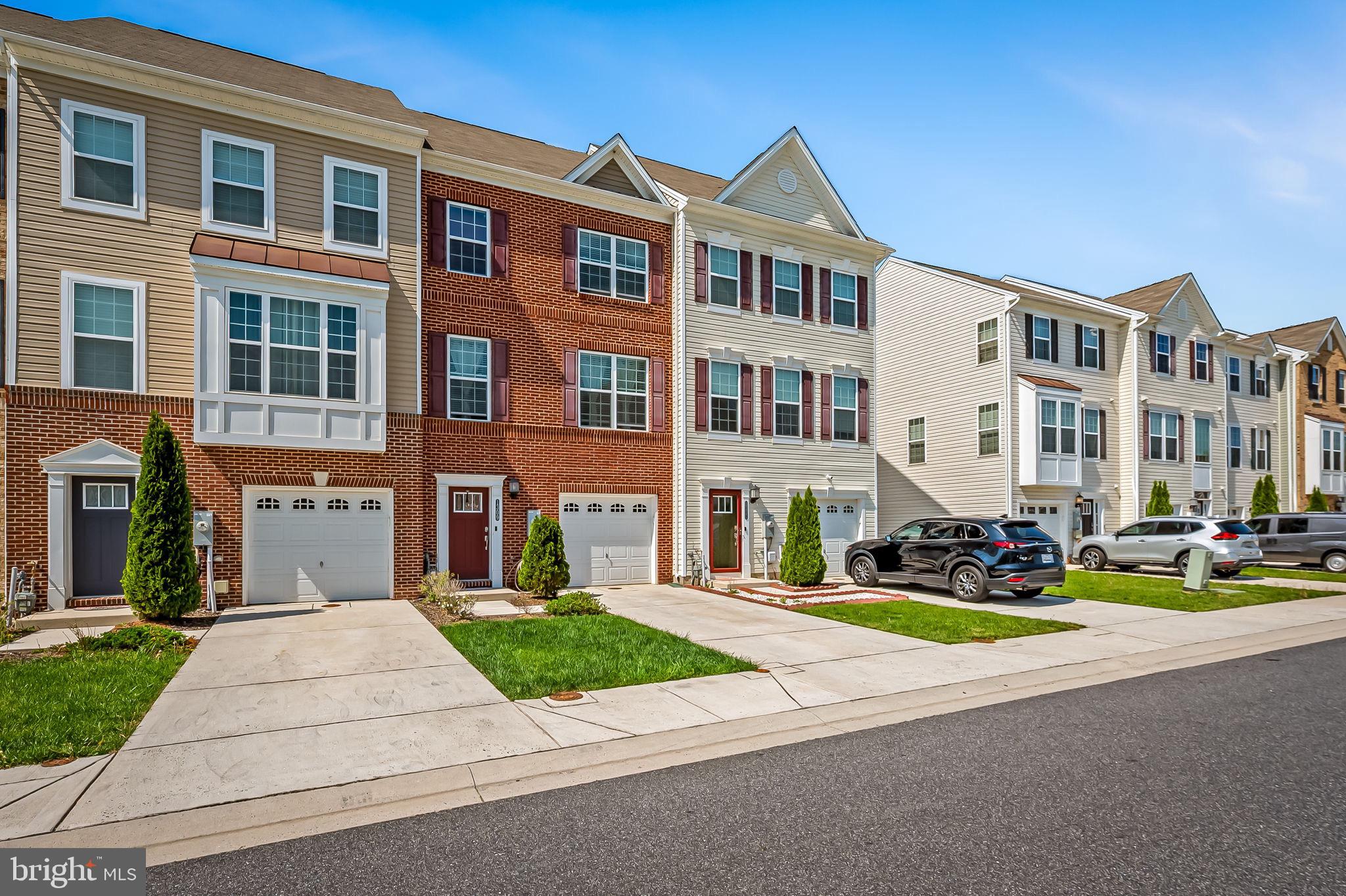 1309 Spindrift Road Aberdeen, MD 21001 - Photo 3 of 35 a front view of a residential apartment building with yard