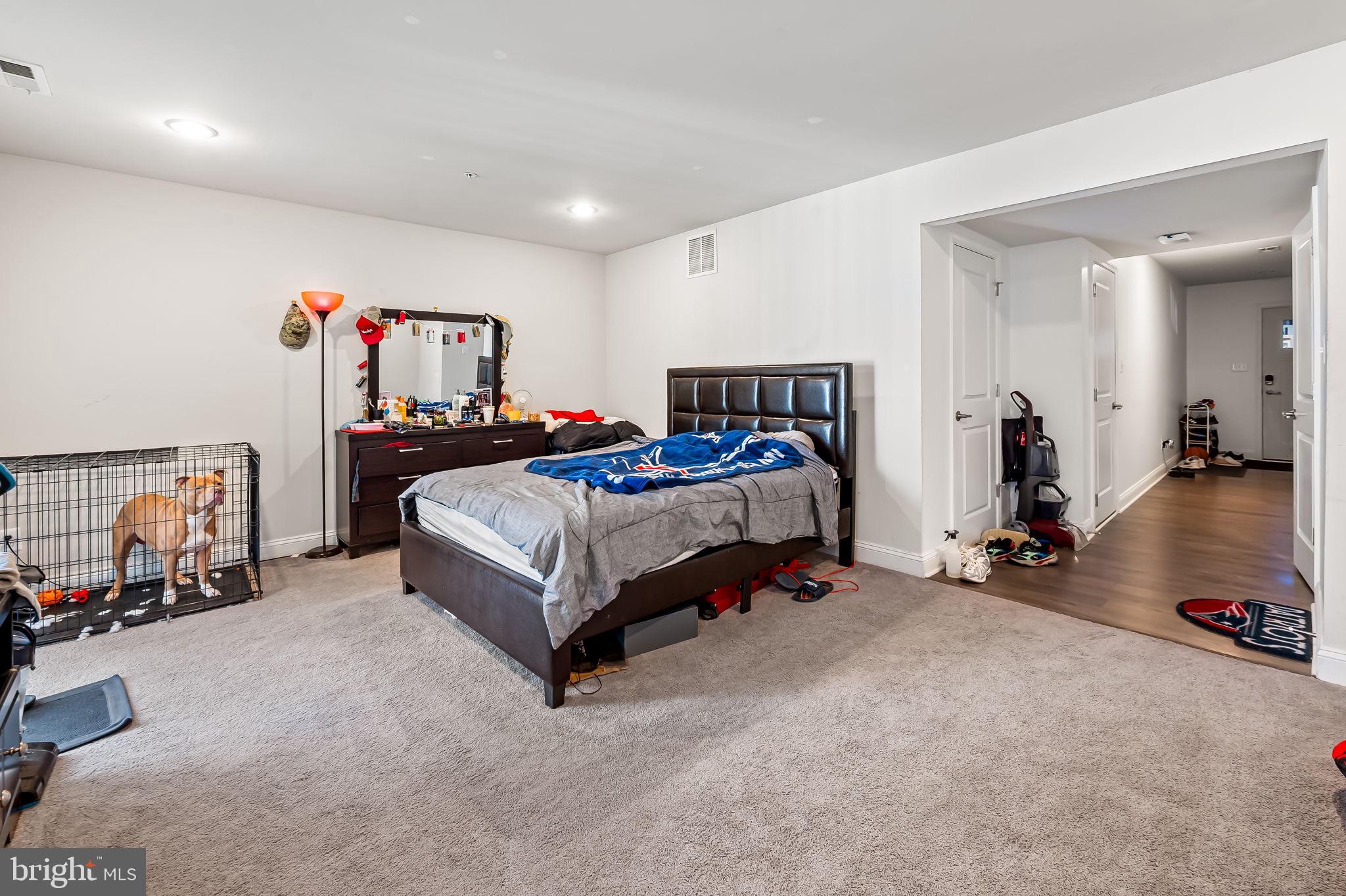 1309 Spindrift Road Aberdeen, MD 21001 - Photo 31 of 35 a bedroom with a bed and a walk in closet