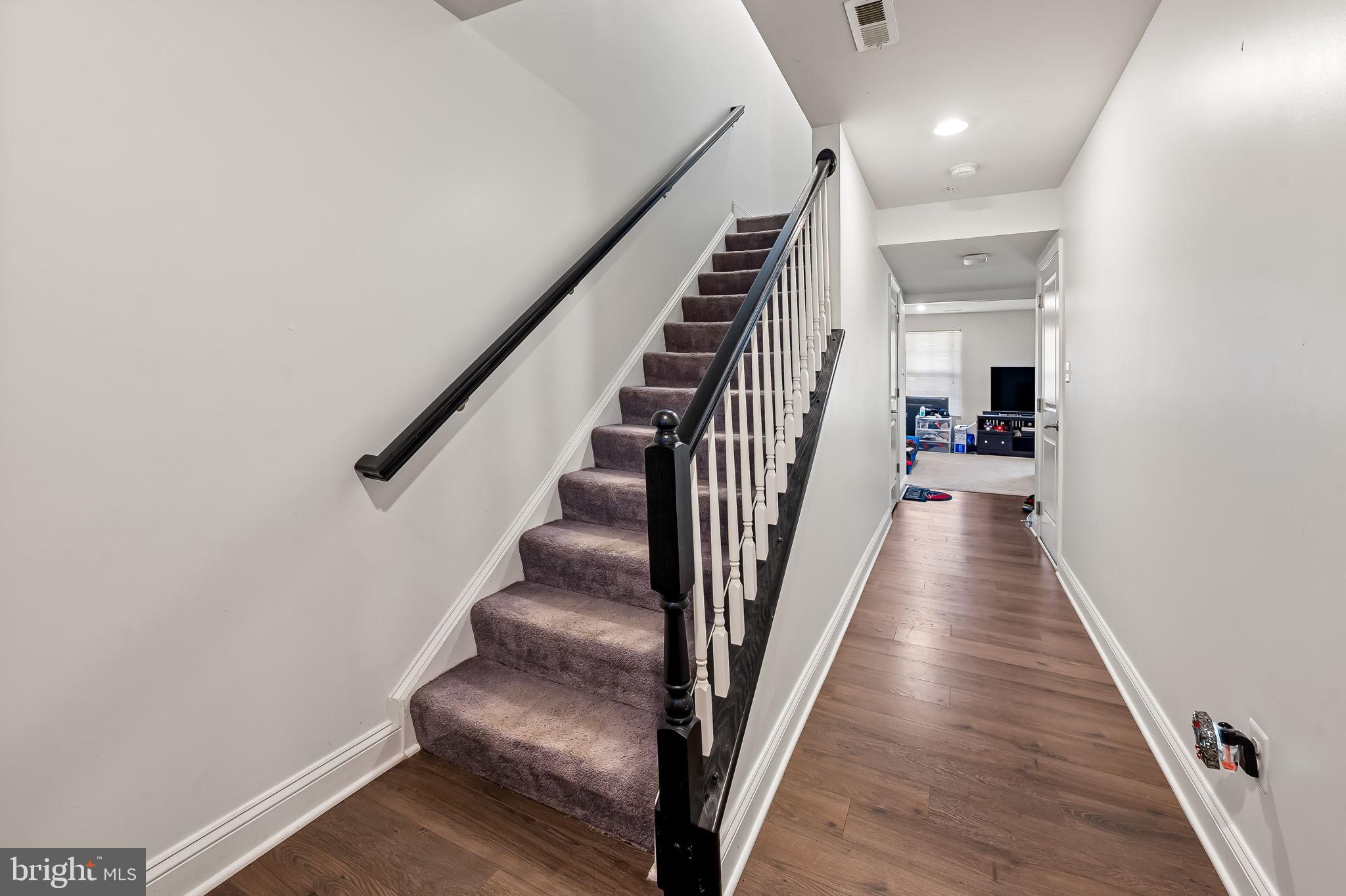 1309 Spindrift Road Aberdeen, MD 21001 - Photo 5 of 35 a view of entryway and hall with wooden floor