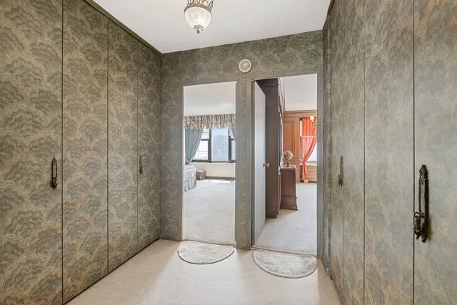 a bathroom with a shower and toilet