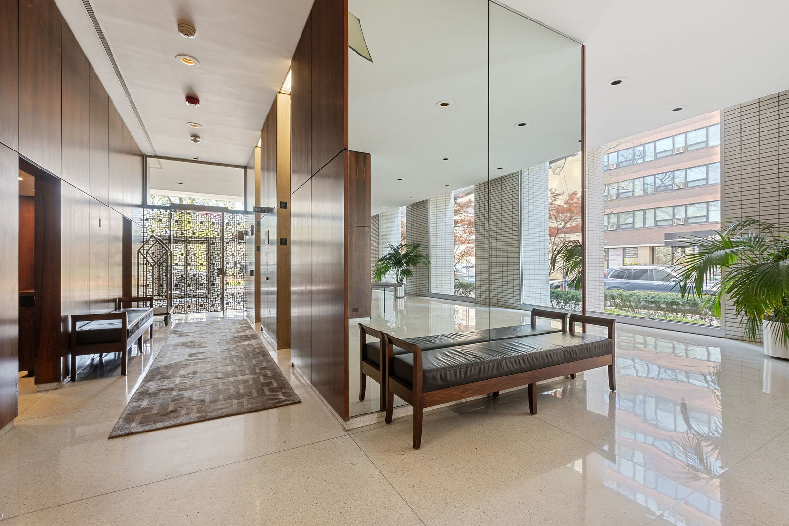 3150 North Lake Shore Drive, Unit 30C Chicago, IL 60657 - Photo 2 of 41 a large living room with large windows and furniture