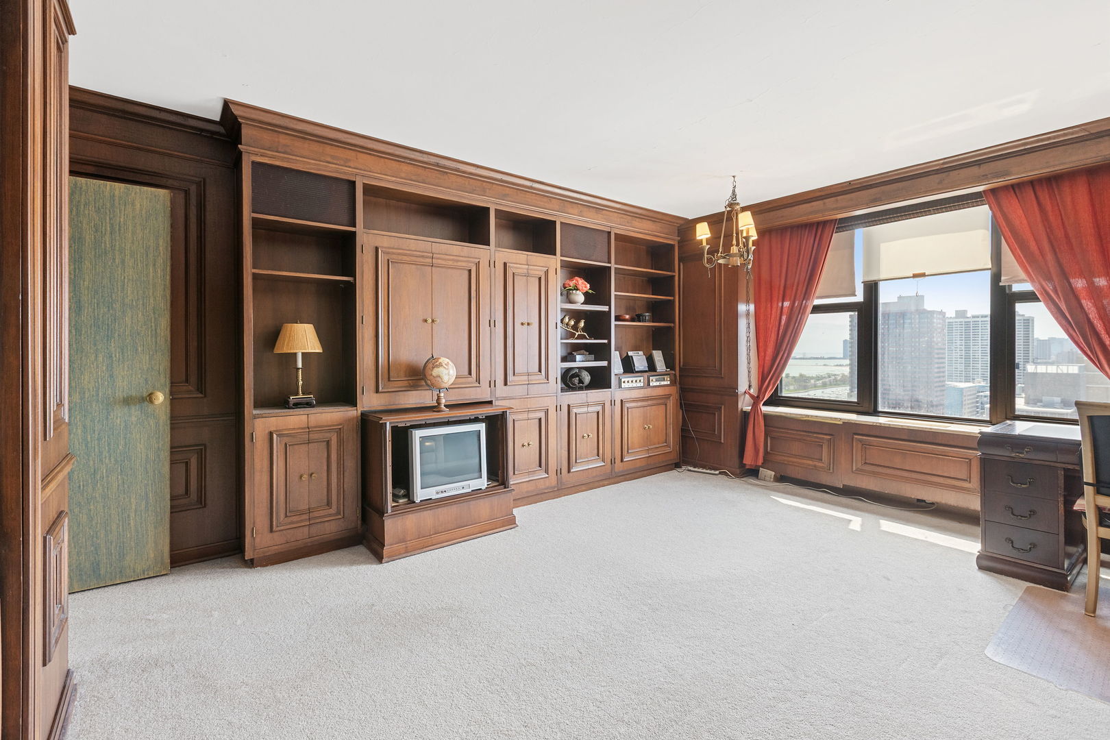 3150 North Lake Shore Drive, Unit 30C Chicago, IL 60657 - Photo 21 of 41 a living room with stainless steel appliances furniture and a large window