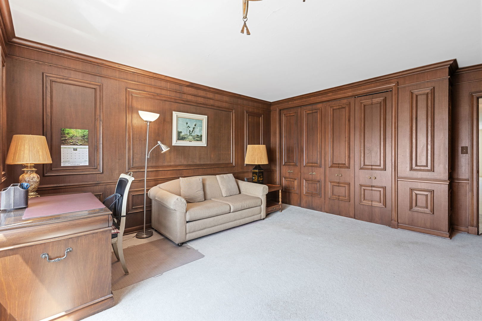 3150 North Lake Shore Drive, Unit 30C Chicago, IL 60657 - Photo 22 of 41 a spacious bedroom with a bed and cabinets
