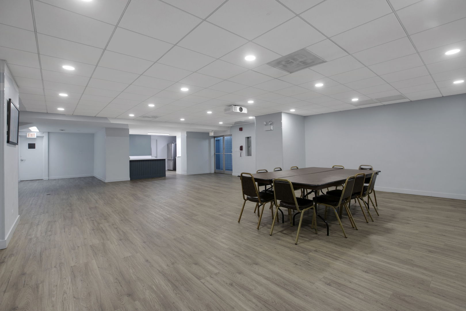 3150 North Lake Shore Drive, Unit 30C Chicago, IL 60657 - Photo 29 of 41 a view of a dining area with furniture and wooden floor