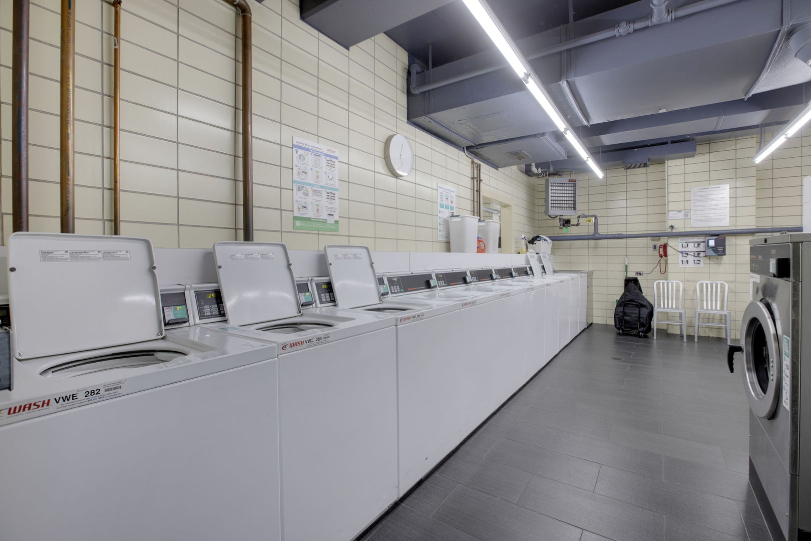 3150 North Lake Shore Drive, Unit 30C Chicago, IL 60657 - Photo 31 of 41 a utility room with dryer and washer