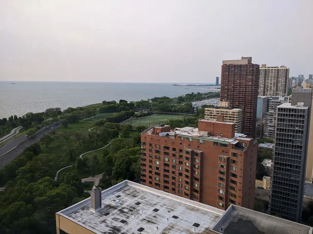 a view of a city with tall buildings