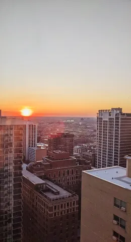 a view of a balcony with city view