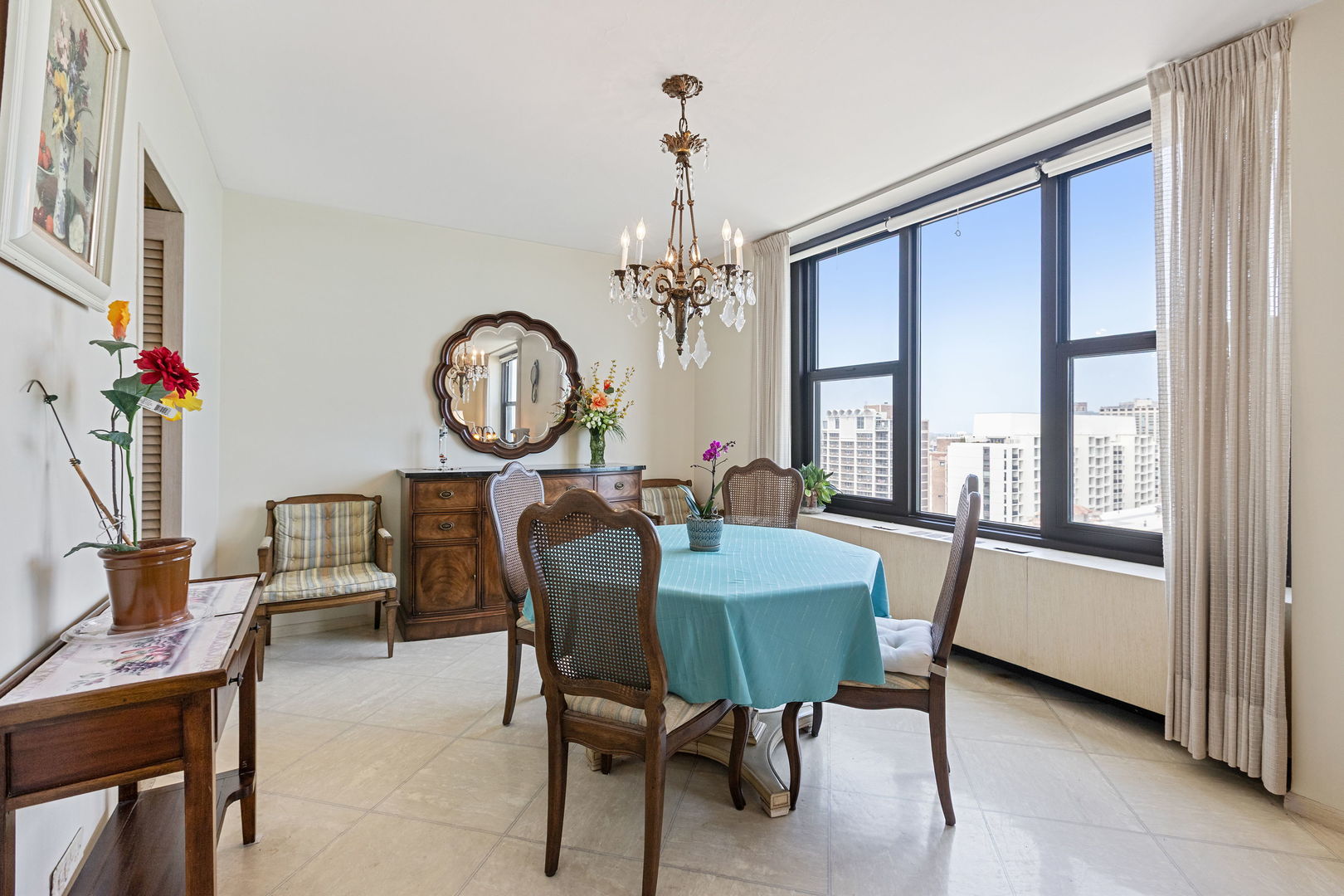 3150 North Lake Shore Drive, Unit 30C Chicago, IL 60657 - Photo 6 of 41 a view of a dining room with furniture window and outside view