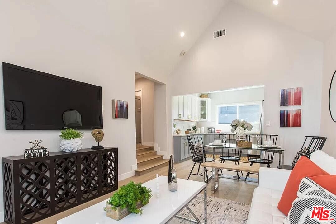 2419 Walnut Avenue Venice, CA 90291 - Photo 1 of 16 a living room with furniture and a flat screen tv