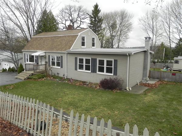 1349 Trapelo Road Waltham, MA 02451 - Photo 14 of 16 a front view of a house with a garden