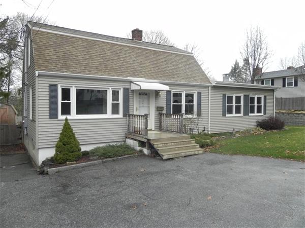 1349 Trapelo Road Waltham, MA 02451 - Photo 2 of 16 a front view of a house with a yard