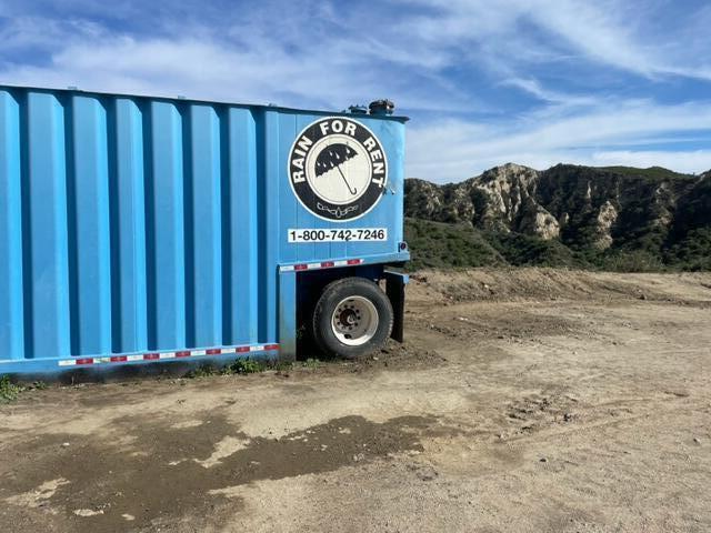 Hasley Canyon Road Castaic, CA 91384 - Photo 22 of 34 a view of a wooden door with a small yard