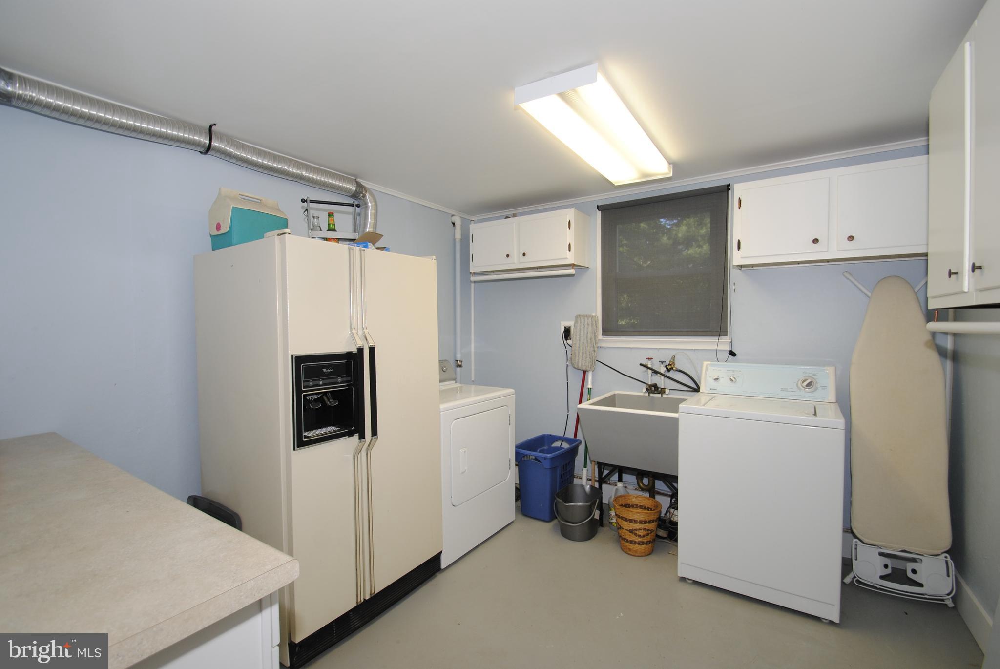 1491 Wakefield Road Edgewater, MD 21037 - Photo 28 of 37 Large Laundry Room with Storage