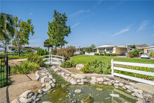 a view of a playground with a yard