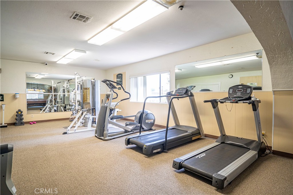 1001 West Lambert Road, Unit 153 La Habra, CA 90631 - Photo 16 of 28 a view of a room with gym equipment