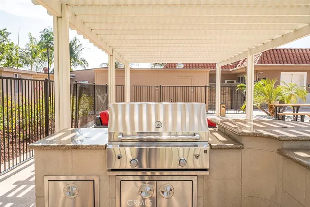 a view of outdoor space with seating area and city view
