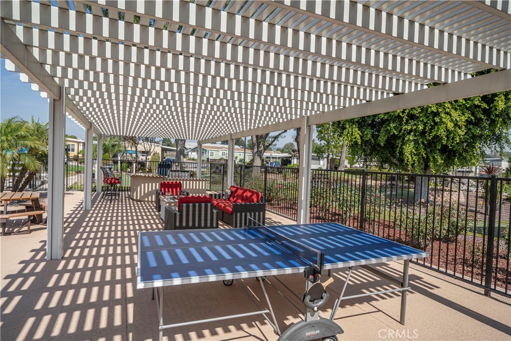 1001 West Lambert Road, Unit 153 La Habra, CA 90631 - Photo 24 of 24 a view of a patio with wooden floor