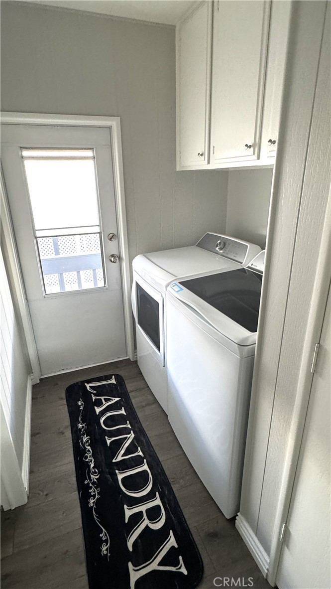 1001 West Lambert Road, Unit 153 La Habra, CA 90631 - Photo 10 of 28 a kitchen with a stove and white cabinets