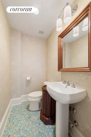 a bedroom with a bed closet and a window