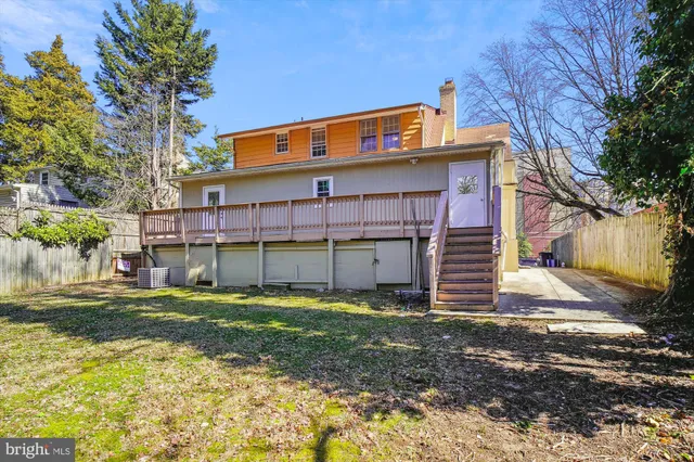 a view of a backyard with a small house