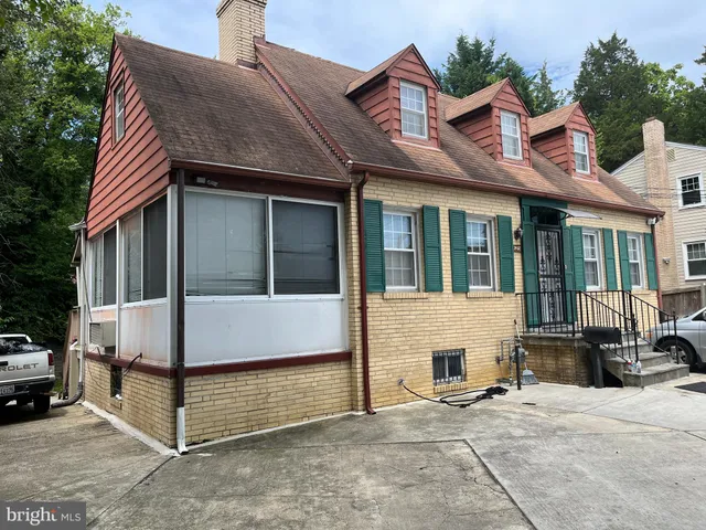 a view of house with outdoor space