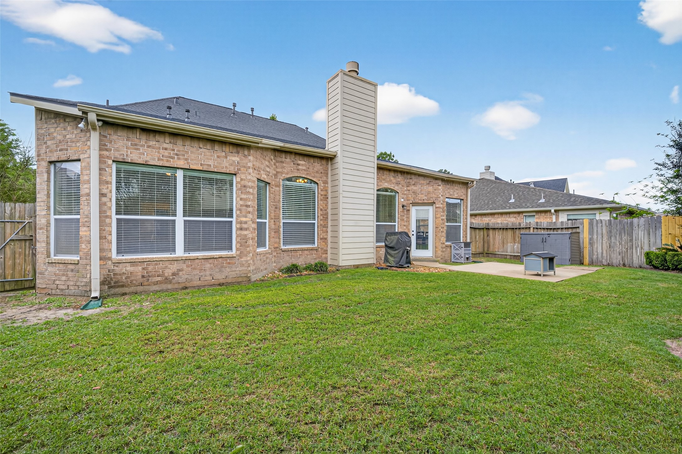 3219 Legends Mist Drive Spring, TX 77386 - Photo 32 of 37 a view of a house with a backyard