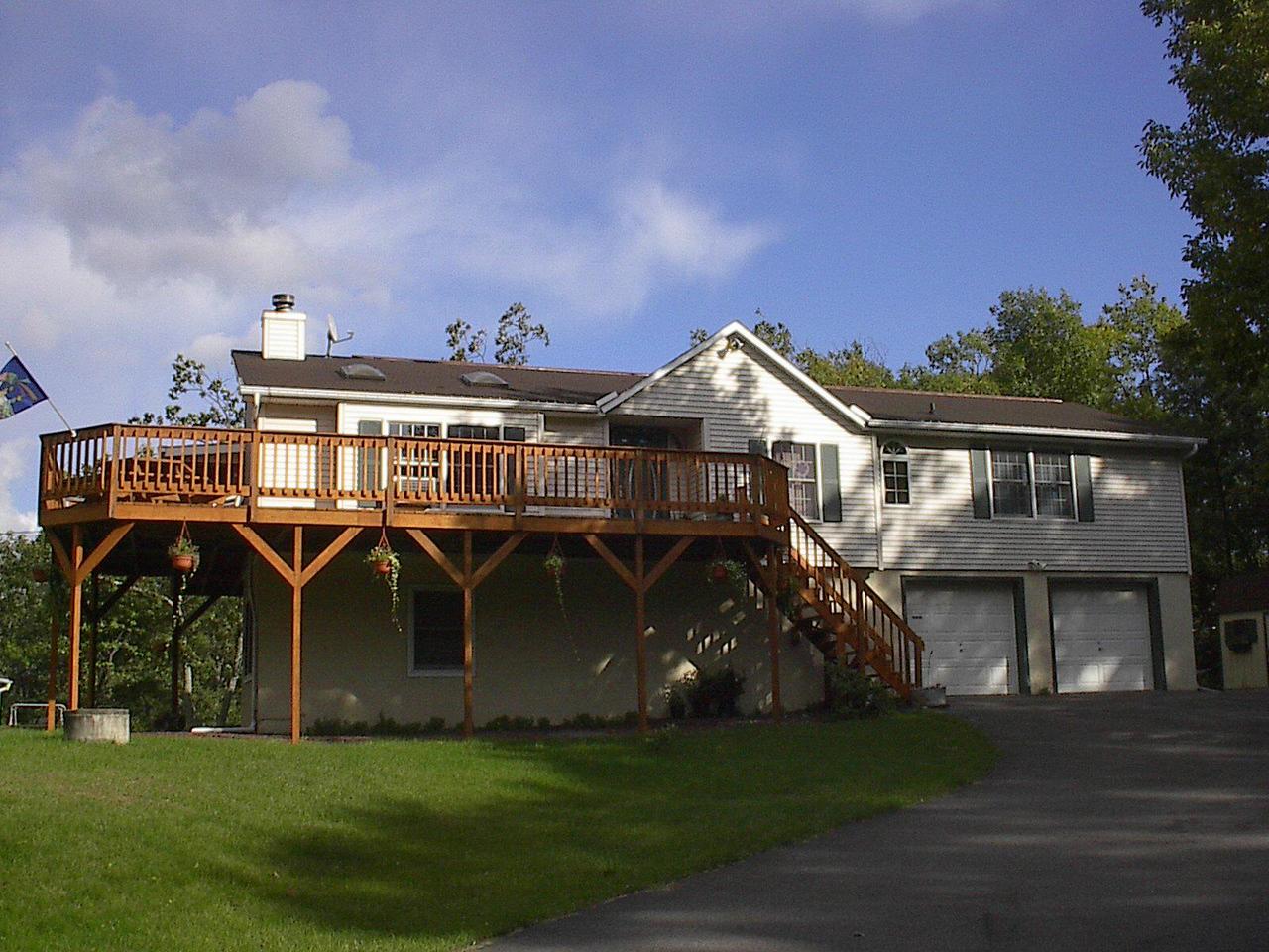 523 Cardinal Road Cresco, PA 18326 - Photo 1 of 1 a view of house with garden