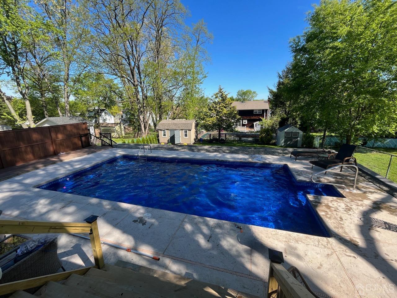82 Normandy Road Colonia, NJ 07067 - Photo 33 of 33 a view of a backyard with sitting area