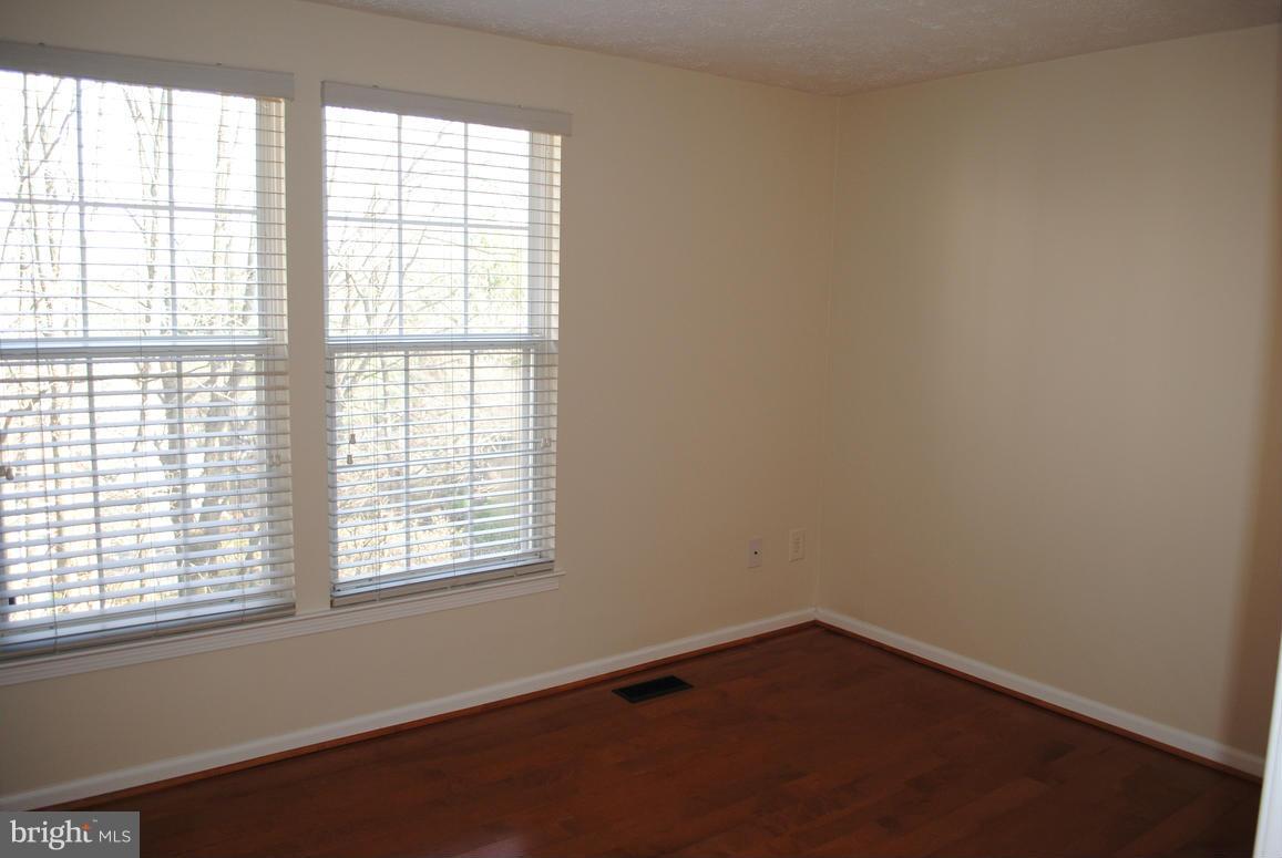 1943 Belmont Ridge Court Reston, VA 20191 - Photo 20 of 26 an empty room with a window