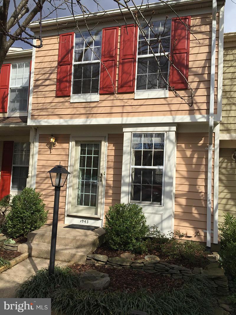 1943 Belmont Ridge Court Reston, VA 20191 - Photo 26 of 26 a front view of a house with a yard